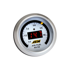 AEM gauge next to ruler showing 52mm size for pod compatibility