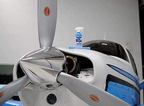 Aero Cosmetics used on an RV in a park demonstrating on-the-go cleaning and protection