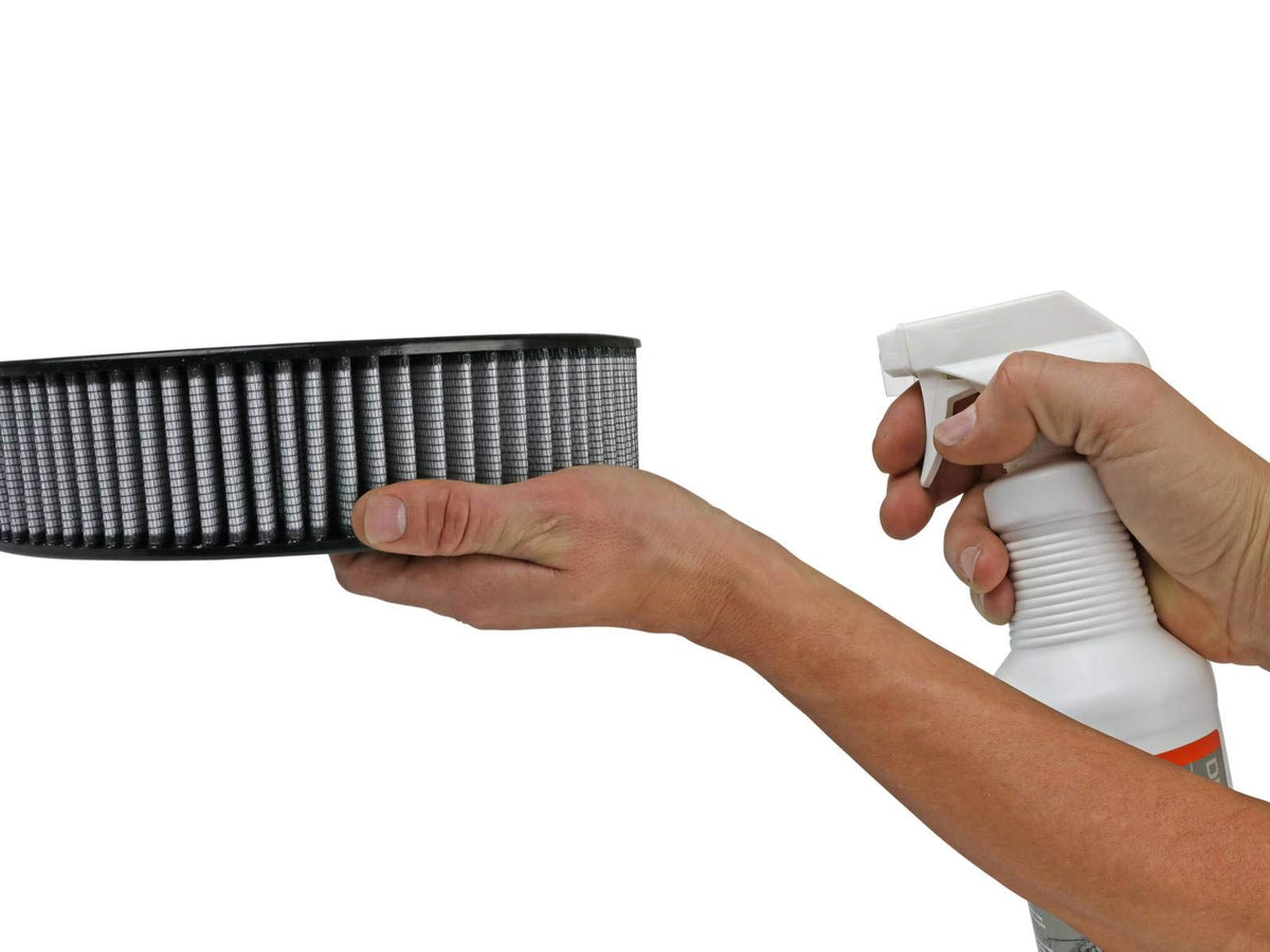 aFe Power cleaner being applied to filter showing safe dirt removal benefit