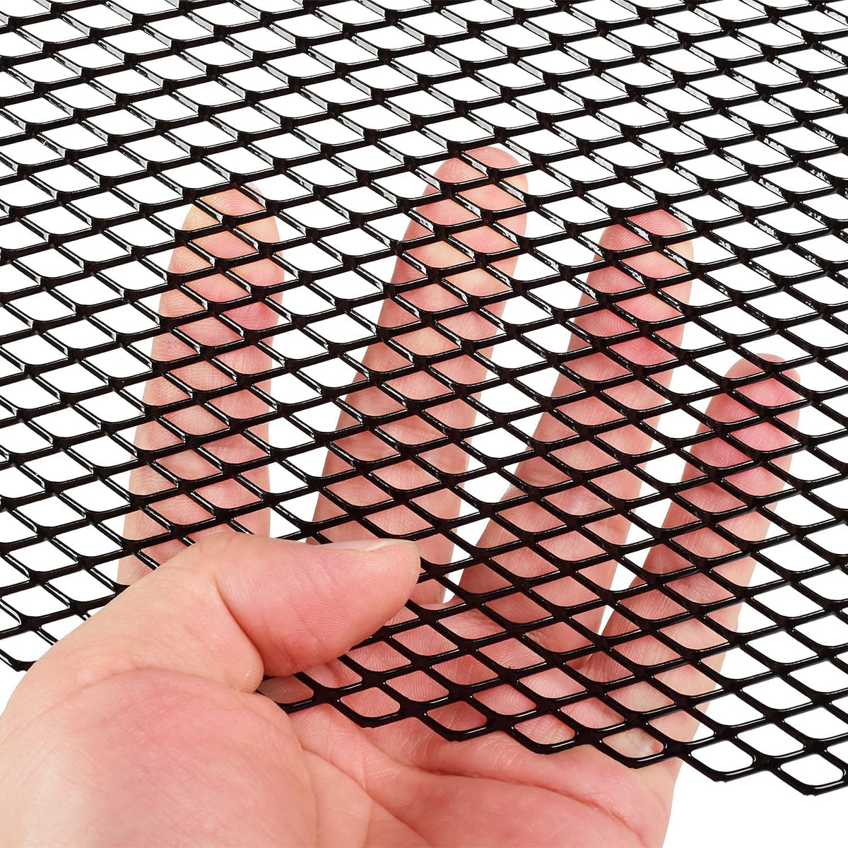 AggAuto close-up of 6x12mm rhombic holes highlighting airflow and debris protection