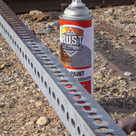 AGS RUST SOLUTIONS close-up nozzle and paint texture demonstrating controlled spray benefit