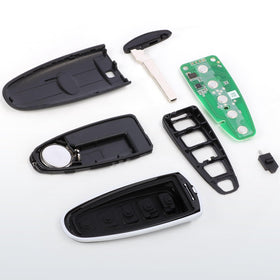 Aichiyu key fob next to coin to show compact scale and portability