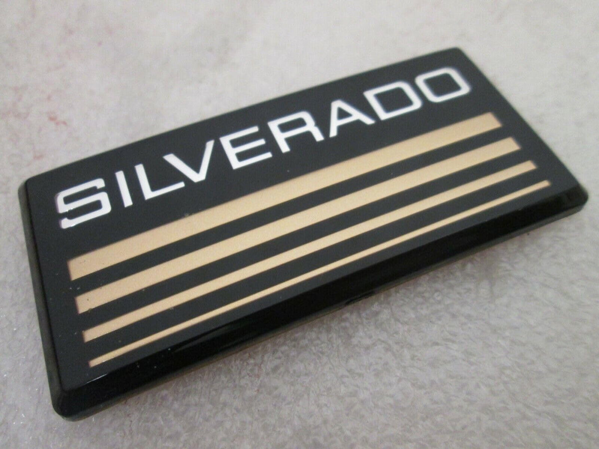 Aimoll emblem installed on Silverado roof pillar demonstrating improved curb appeal benefit