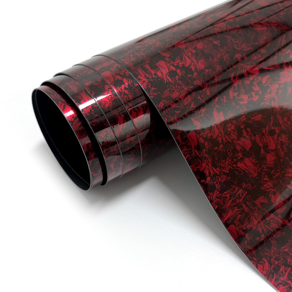 Aisbarika front packaging showing red forged carbon wrap and roll benefit