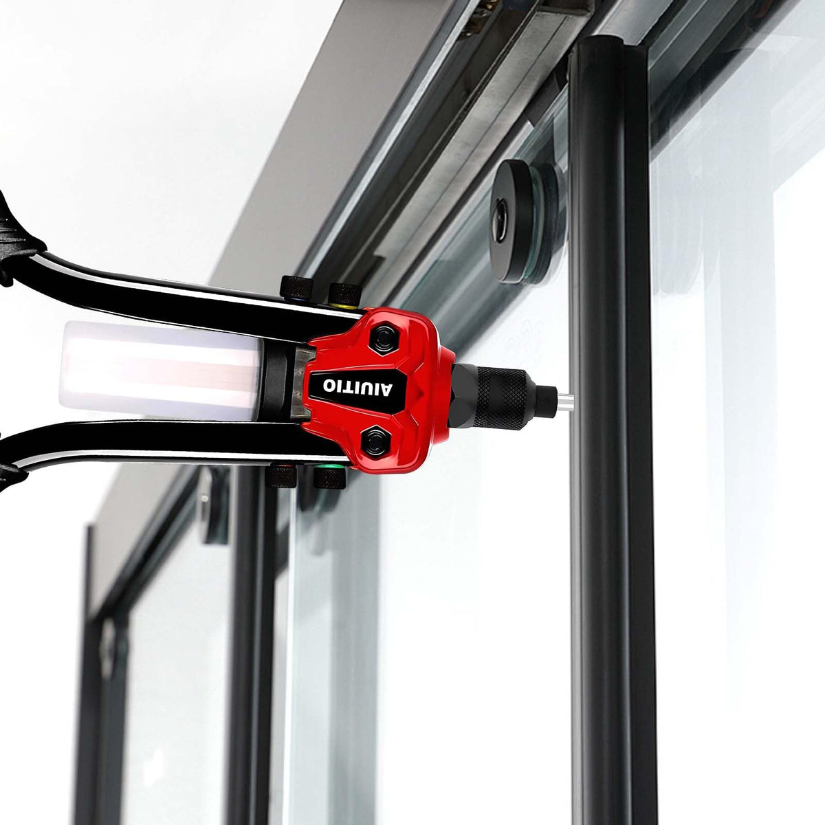 AIUITIO rivet gun in van repair scene securing metal panel for mobile workshop tasks