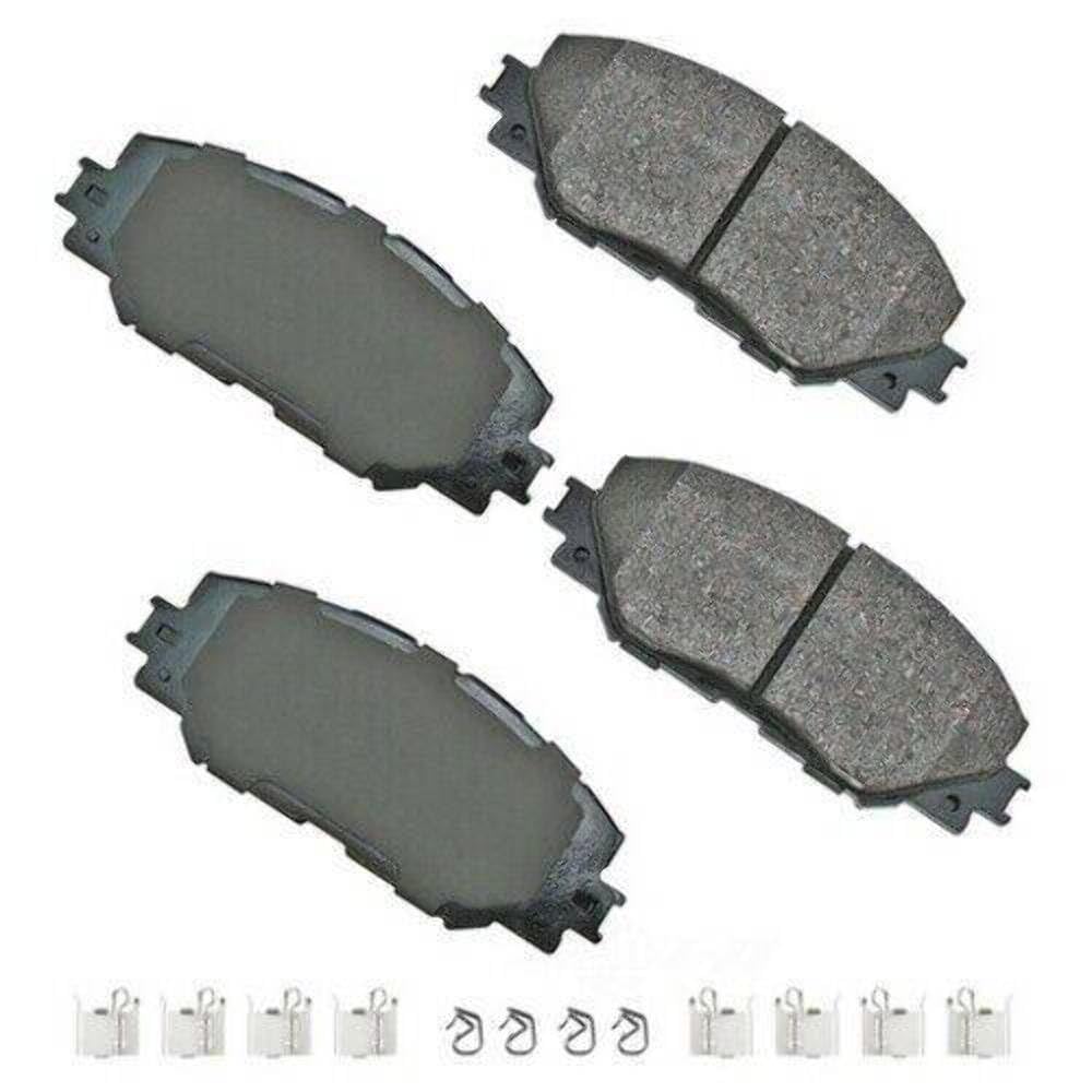 Akebono ACT1210A front packaging view showing pads and retail box, highlighting fit and low-dust benefit