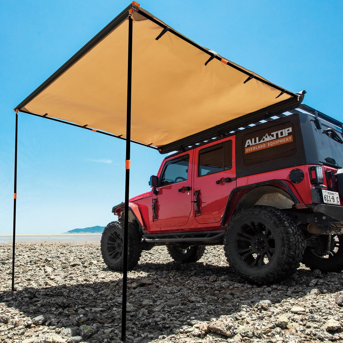 ALL-TOP awning front view mounted on roof rack showing full shaded area and weather protection
