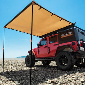 ALL-TOP awning front view mounted on roof rack showing full shaded area and weather protection
