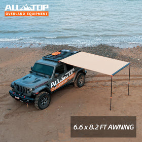 ALL-TOP awning with side wall accessory attached offering added privacy and wind protection