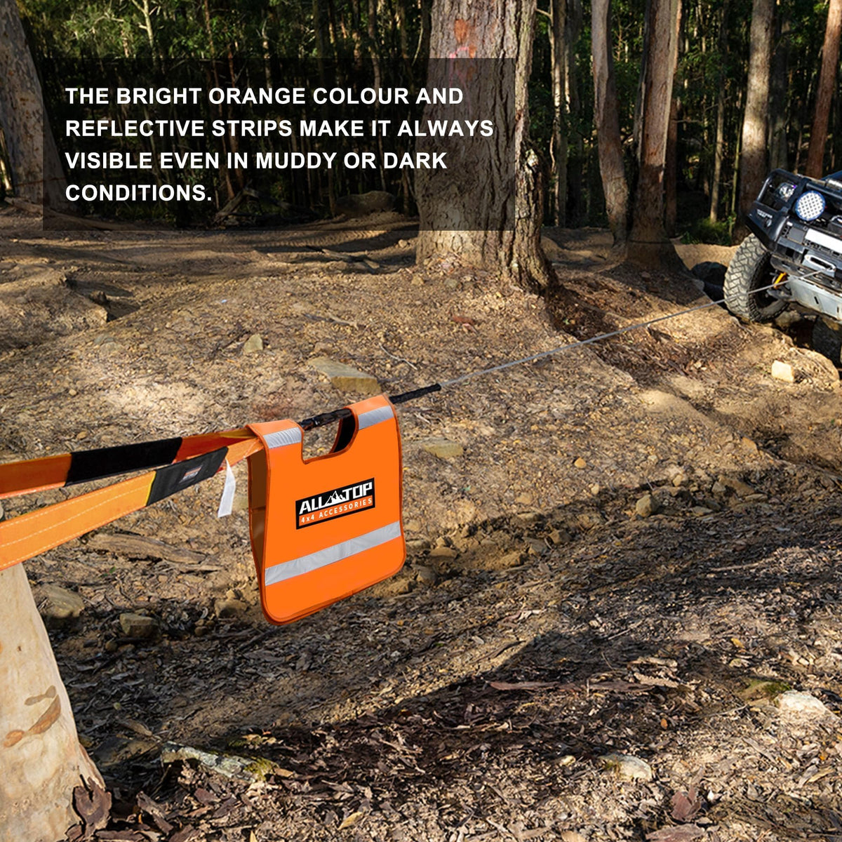 ALL-TOP dampener laid on winch cable during active vehicle recovery for safety