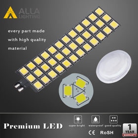 Alla Lighting beside ruler to show compact physical size