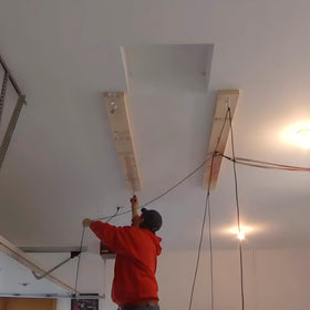 ALLCOS hoist installed over Jeep Wrangler demonstrating space savings