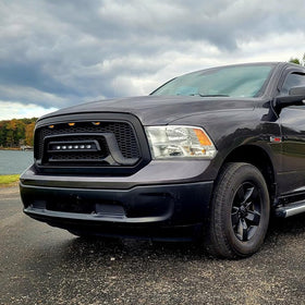 Allinoneparts grille on truck in road setting highlighting bold styling and real-world presence
