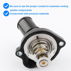 Allmotorparts thermostat housing installed in engine bay demonstrating proper placement
