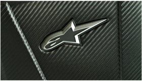 Alpinestars backpack worn by cyclist on road improving stability and visibility