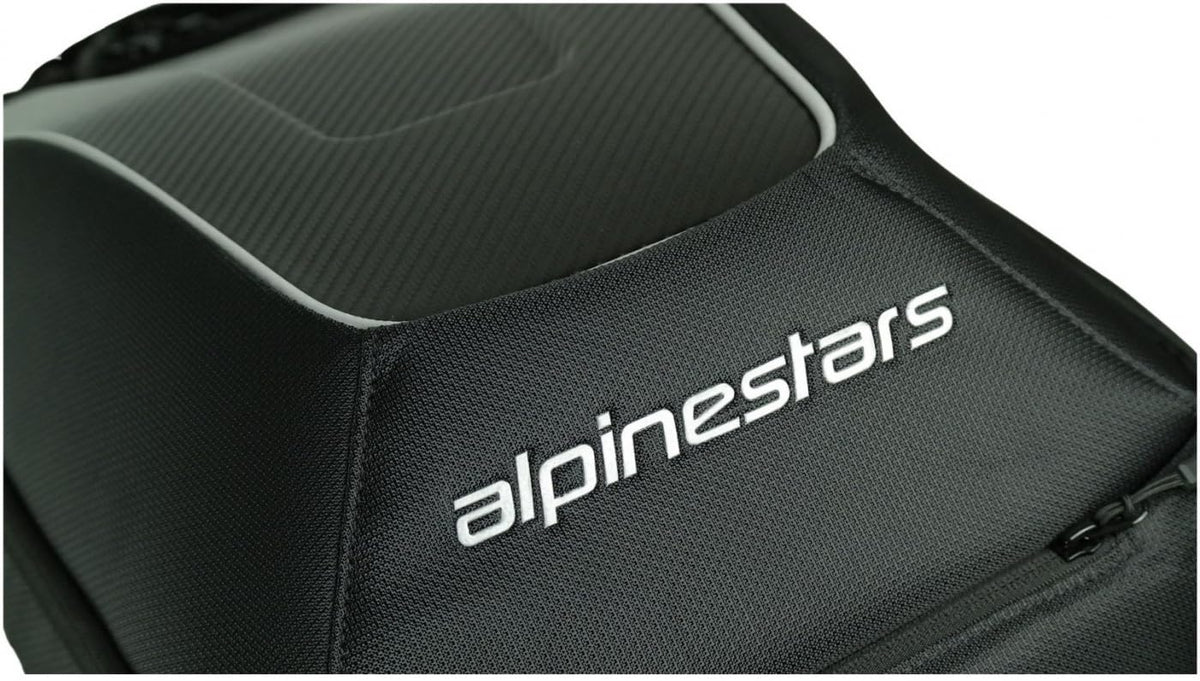Alpinestars rain cover deployed protecting backpack contents in wet weather