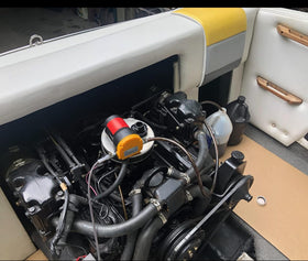 Amarine Made hoses and battery clamps arranged to show included accessories