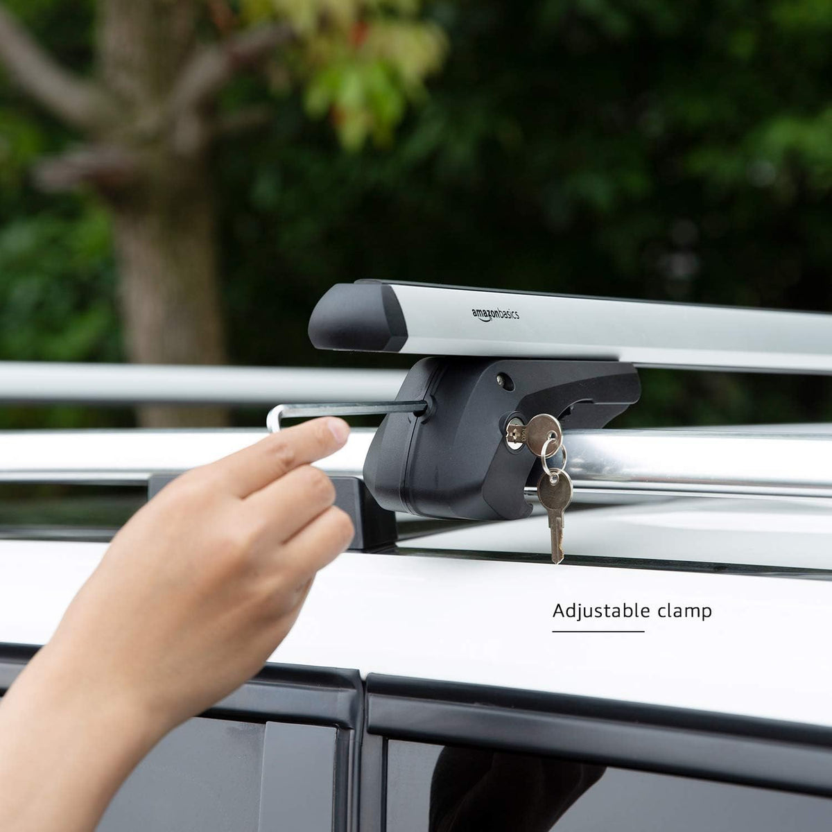 Amazon Basics cross rails next to tape measure showing 52-inch length and scale for accurate fit