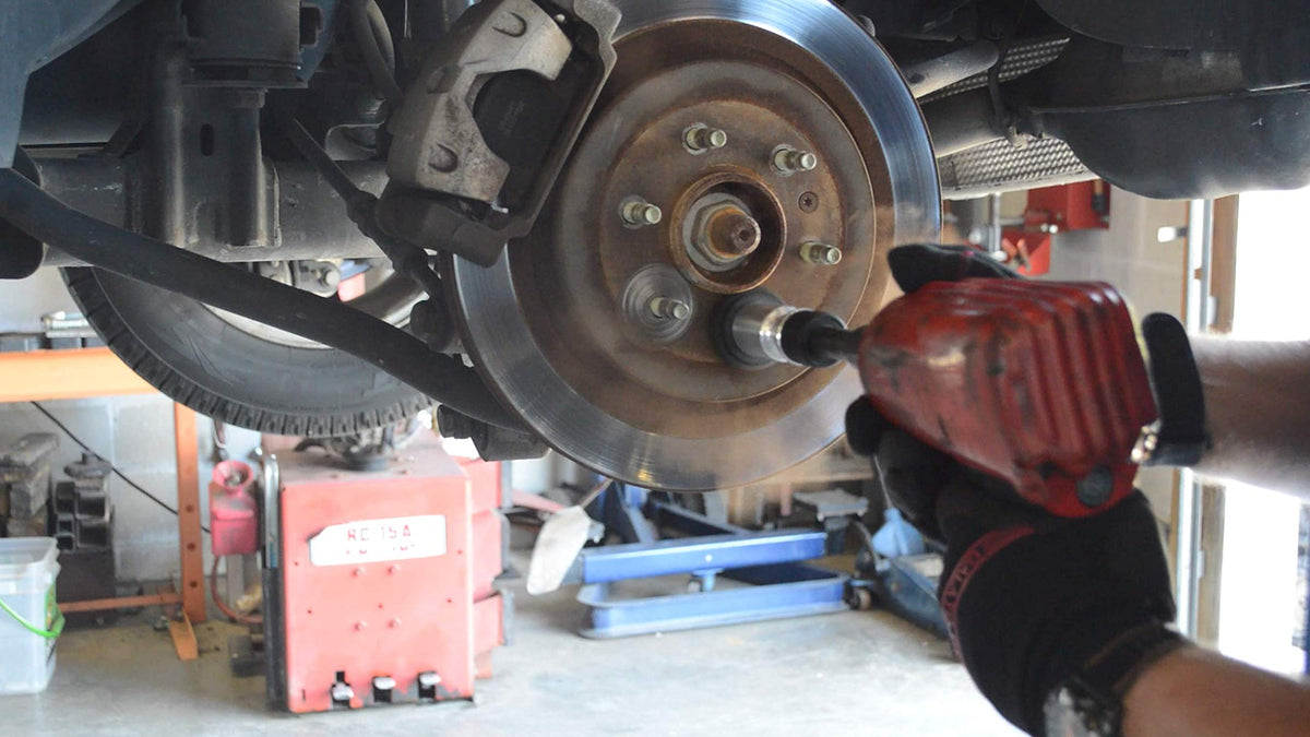 AME INTL Hub Buddy mounted to 1/2" impact wrench cleaning hub surface