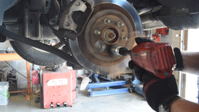 AME INTL Hub Buddy mounted to 1/2" impact wrench cleaning hub surface