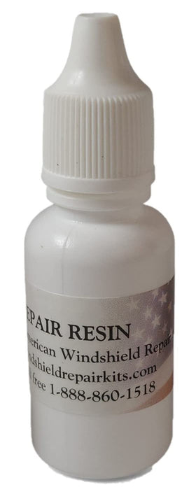 American Windshield Repair Systems resin being applied with a bridge injector for clear repair
