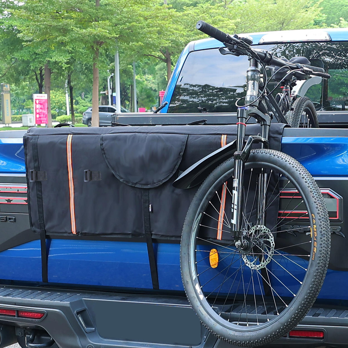 Amooca pad in truck for scale showing fit on small and full-size pickups