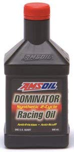 Amsoil Dominator close-up pour into measuring cup demonstrating precise mixing benefit
