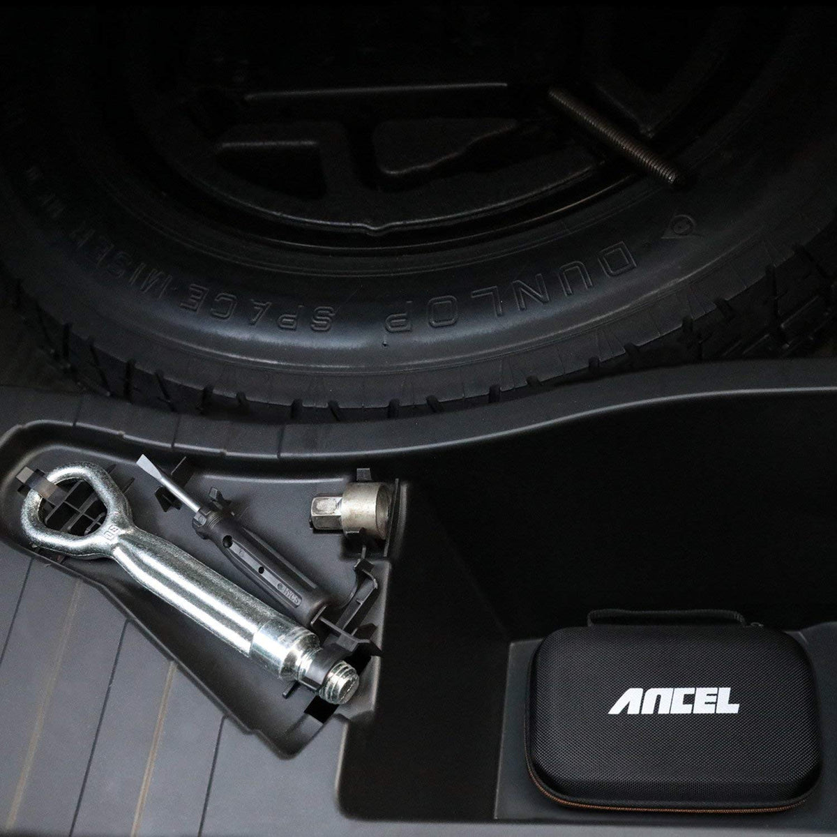 ANCEL case next to a hand and ruler showing compact 7.9 x 5.5 x 2.8 inch size