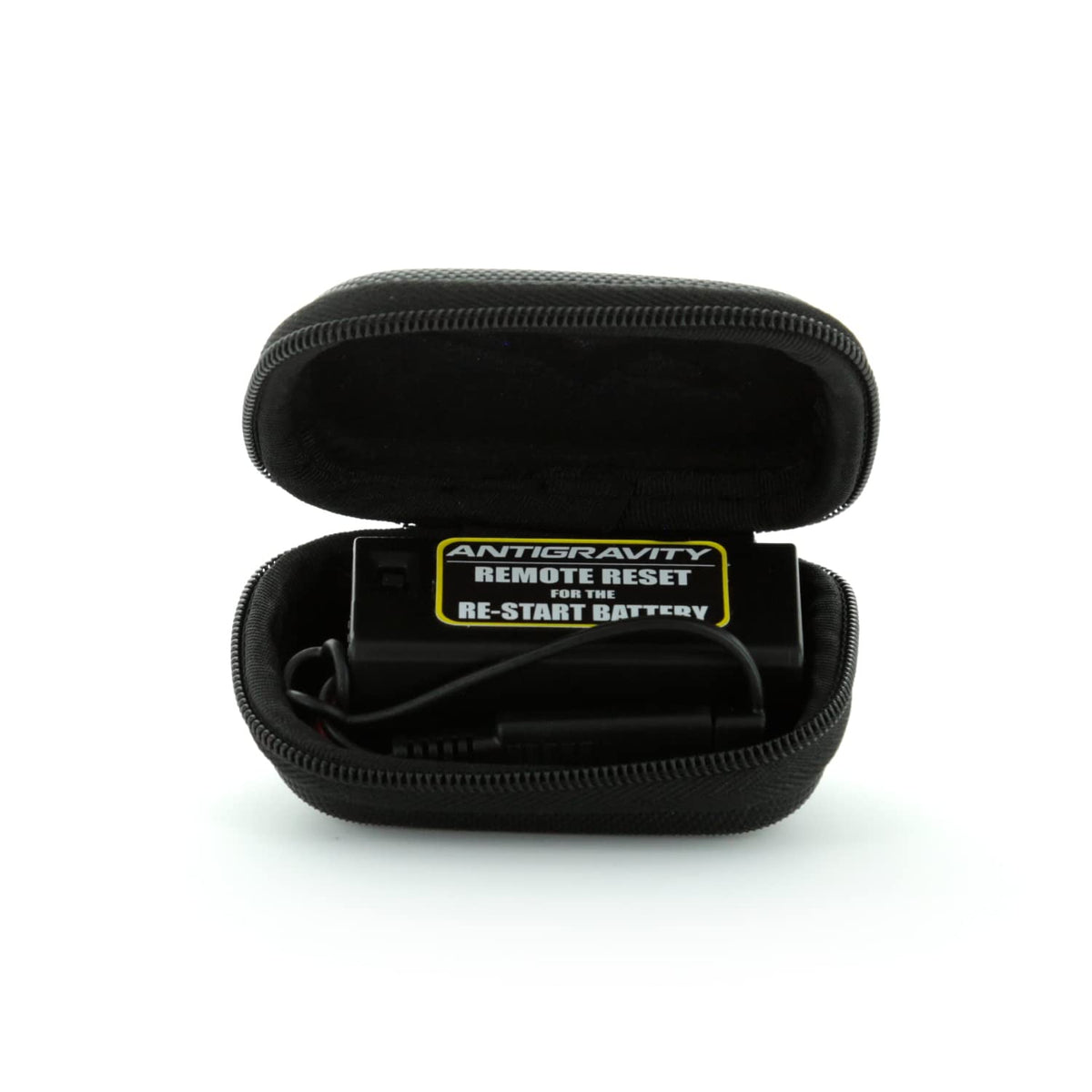 Antigravity Batteries remote beside a 9V battery showing required power and small footprint