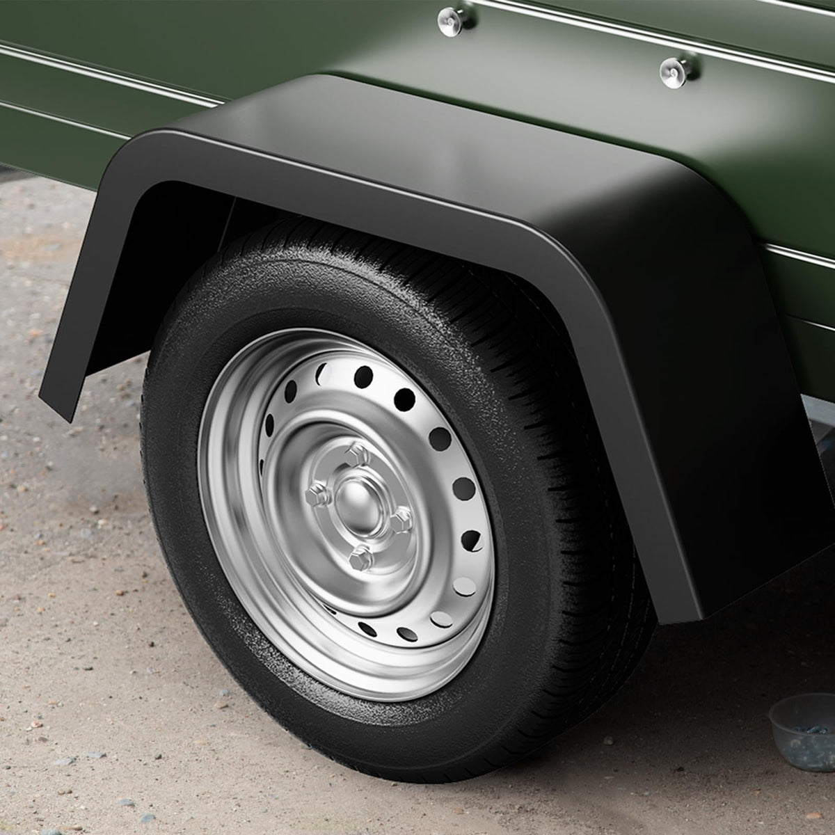 Aoile fender on a landscape trailer in use protecting tires from debris