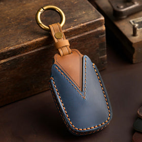 Aoocar key fob cover in hand illustrating compact scale and improved grip