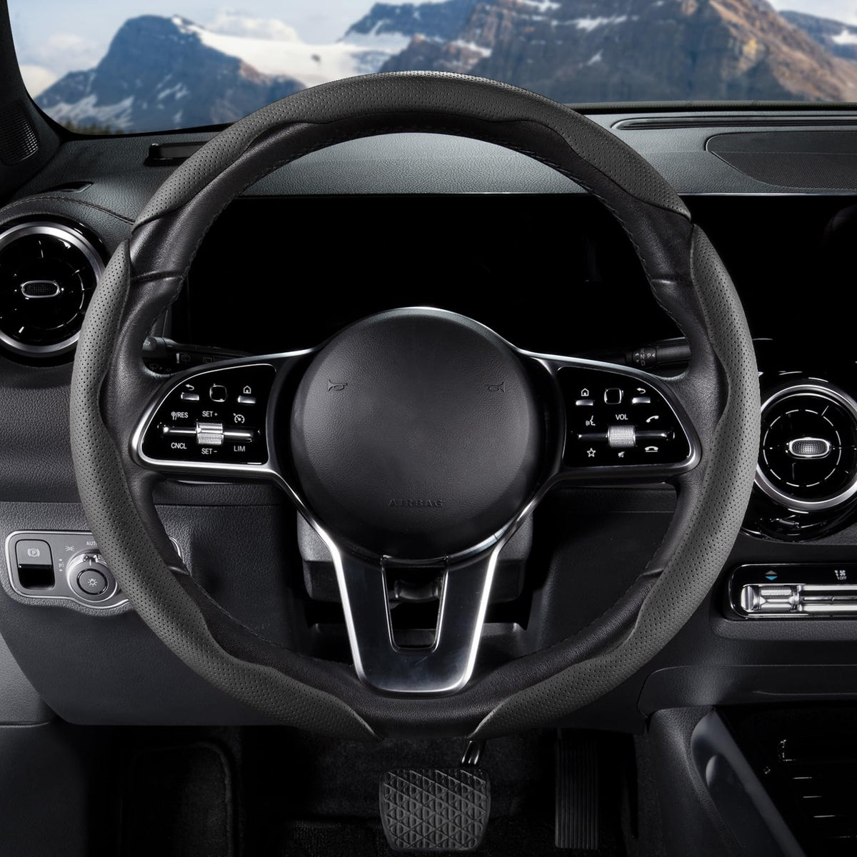 Aotoyou hand gripping the wheel to show improved traction and safer steering