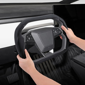 Aotoyou cover next to ruler showing scale and exact fit for Cybertruck wheel