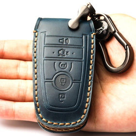 APEKUU hand holding shell showing size and comfortable grip