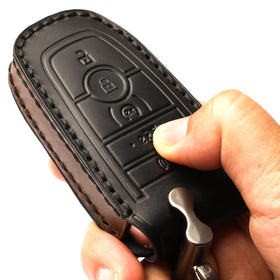APEKUU key shell beside a ruler showing compact size and pocket-friendly benefit