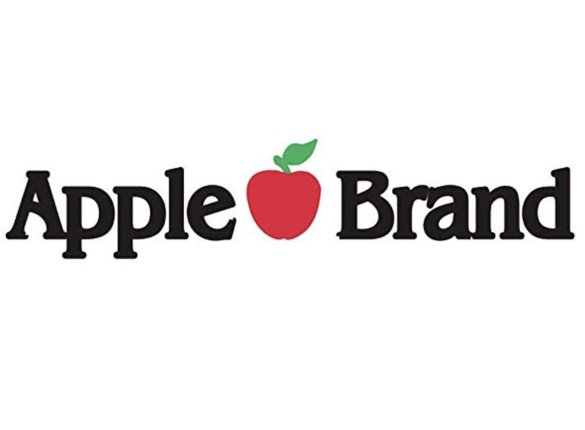 Apple Brand lifestyle shot with bag on table showing refreshed leather
