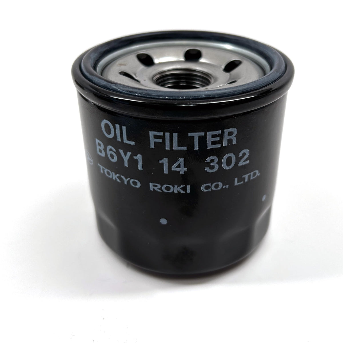 APSG oil filter installed in cartridge housing on Mazda engine, demonstrates correct fit