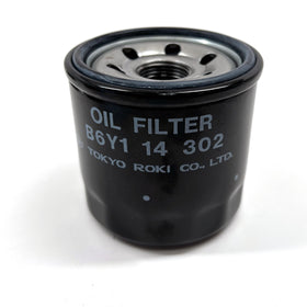 APSG oil filter installed in cartridge housing on Mazda engine, demonstrates correct fit