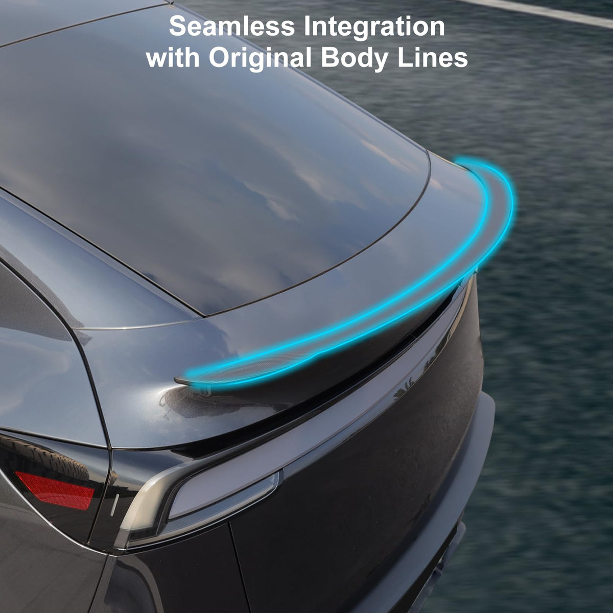 Arcoche spoiler on Model Y Juniper driving shot showing elevated road stability