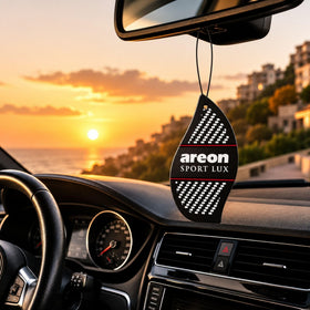 AREON single paper hanger close-up displaying texture and long-lasting scent benefit