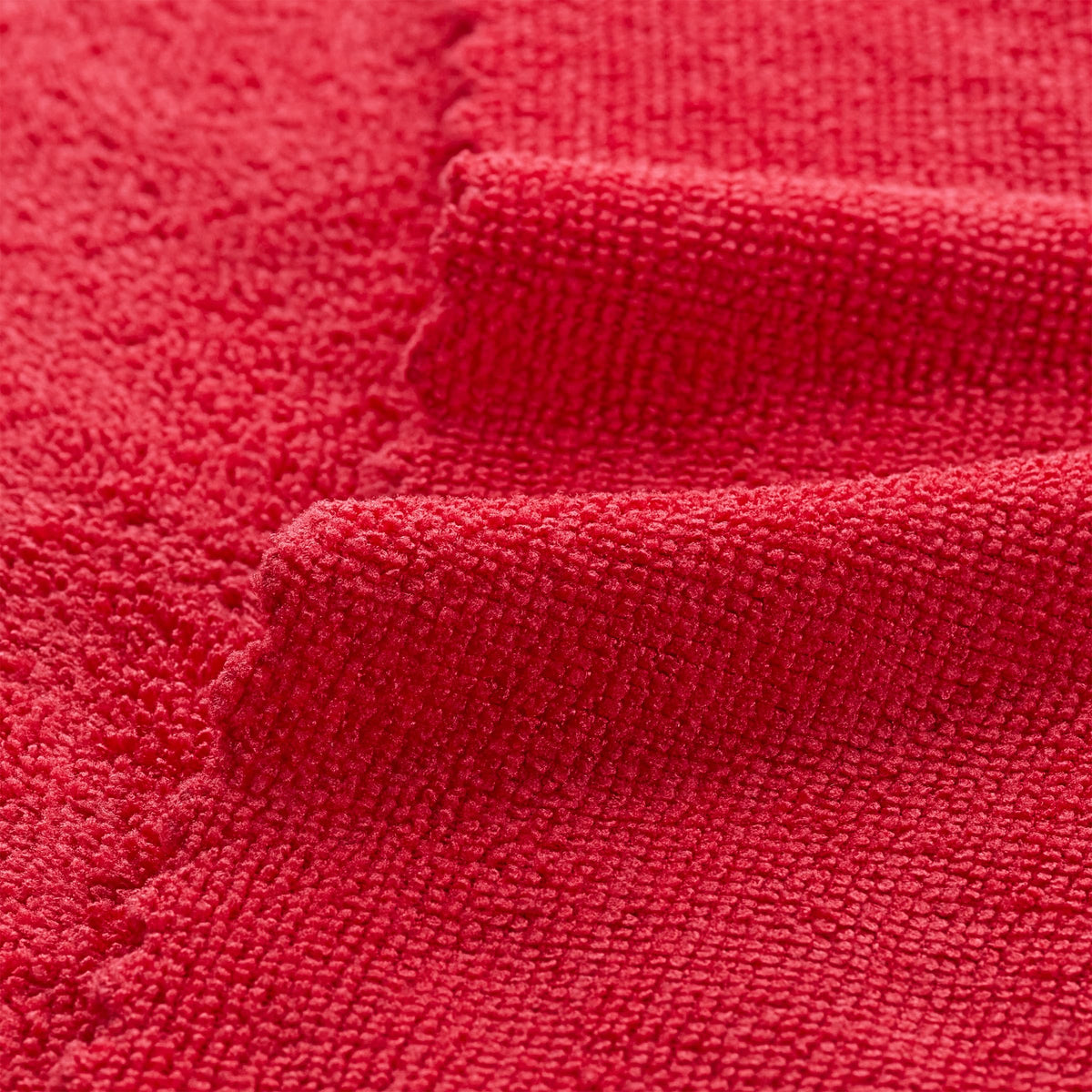 Arkwright SmartRags held in hand demonstrating soft texture and control