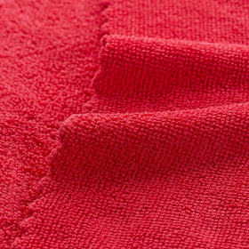 Arkwright SmartRags held in hand demonstrating soft texture and control