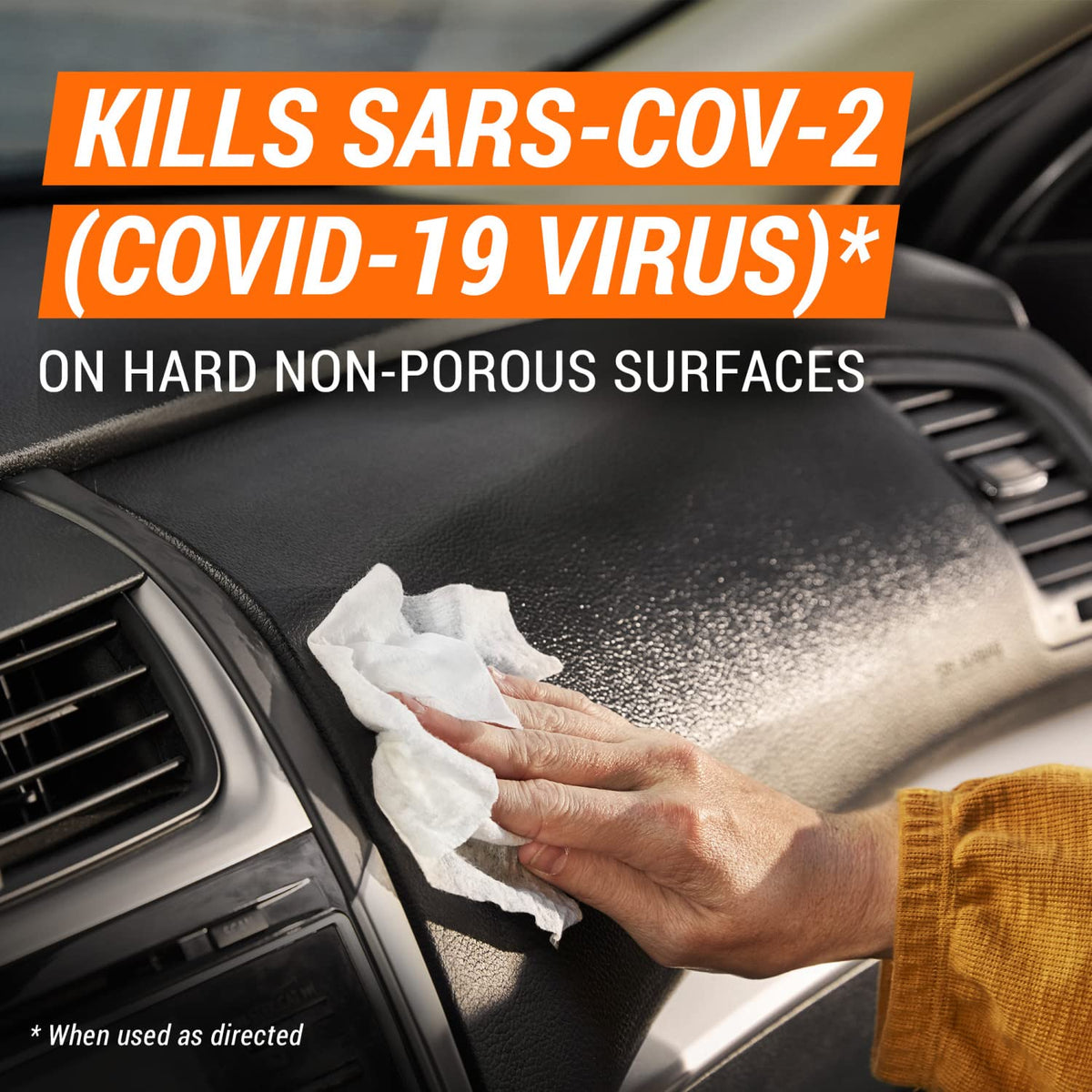 Armor All wipe cleaning a dashboard, demonstrating fast removal of grime and visible freshness