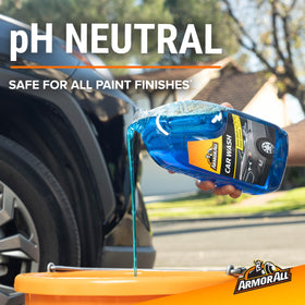 Armor All thick foam lather on car surface for improved cleaning contact