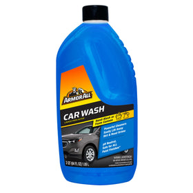 Armor All used in driveway washing car demonstrating finish-safe cleaning benefit