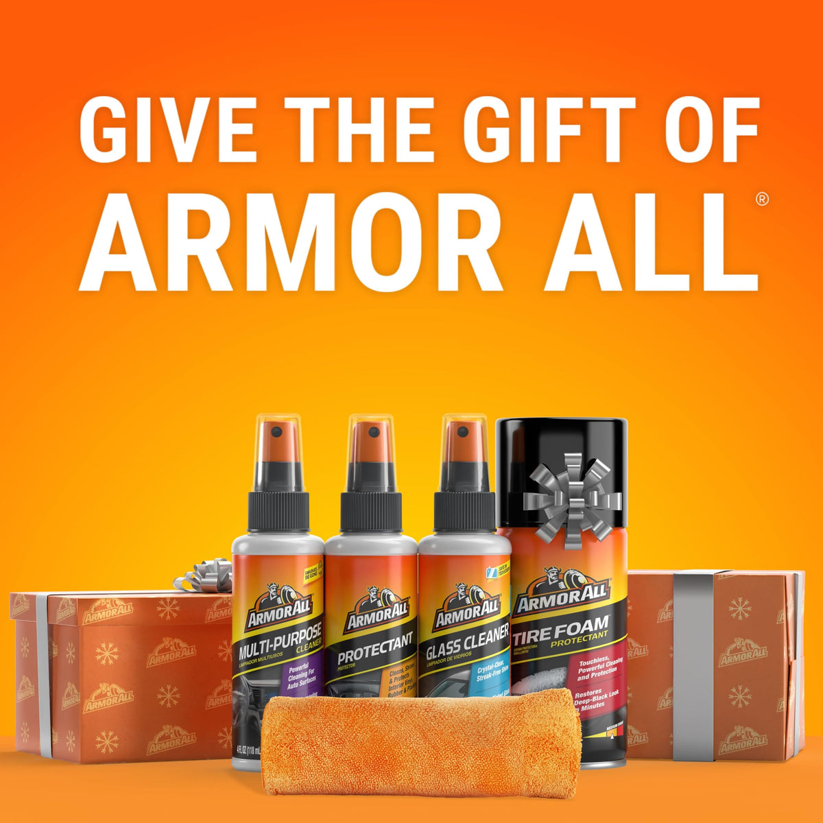 Armor All kit beside parked car in driveway ready for on-the-go detailing