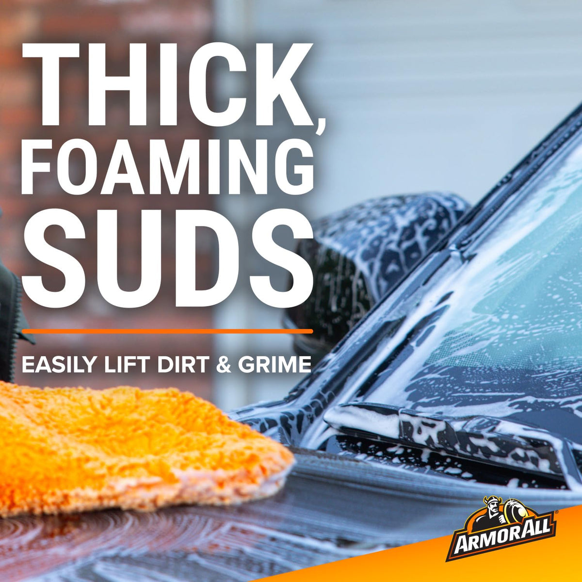 Armor All being poured from the one-gallon bottle for easy refill and measured application benefit