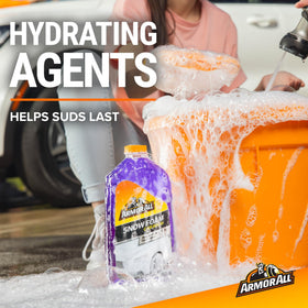Armor All foam rinsing off a wet car illustrating effective residue removal