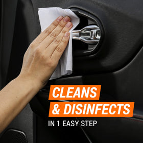 Armor All wipe on a car touchscreen, indicating safe cleaning and clear display visibility