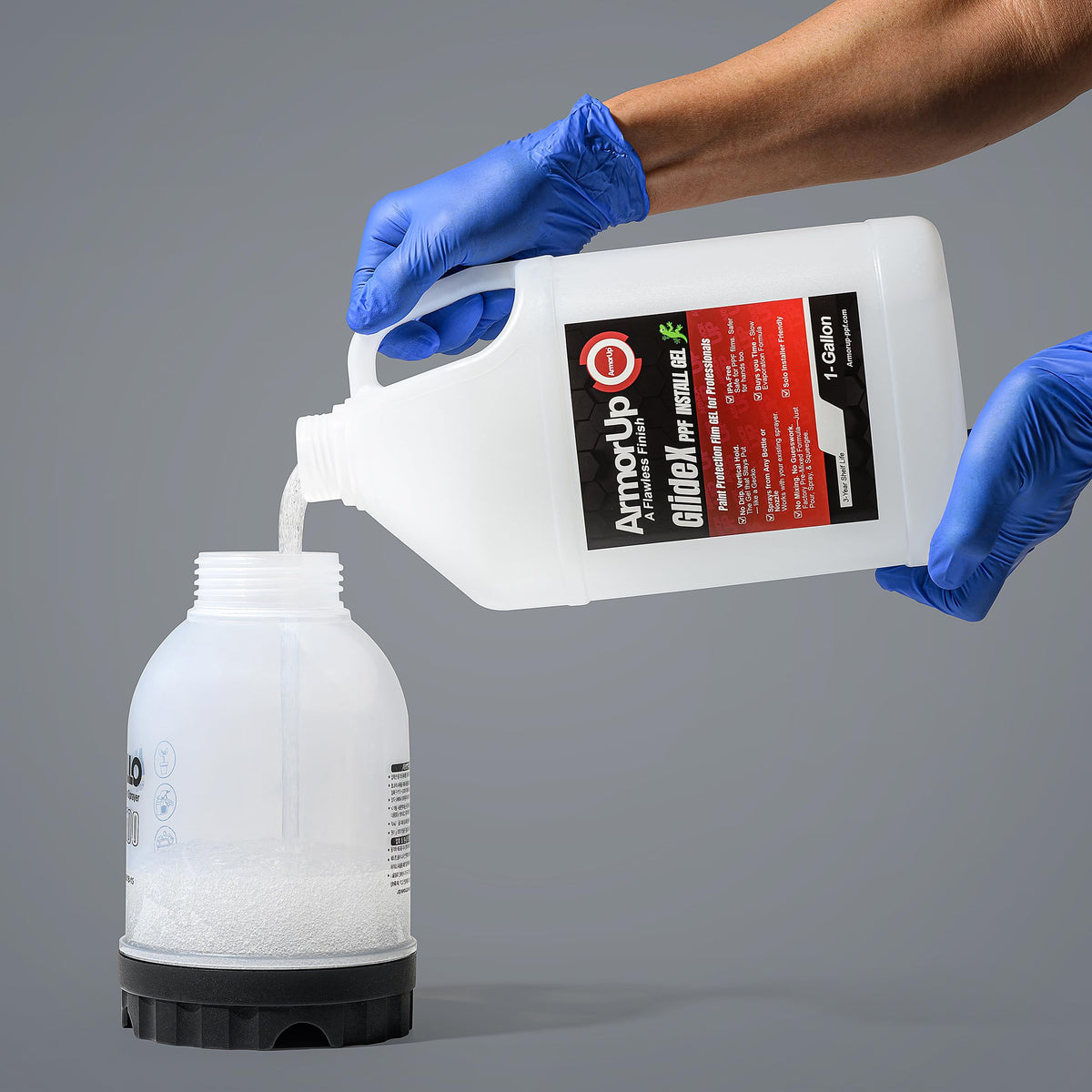 ARMOR UP spraying action shows easy application from standard bottle